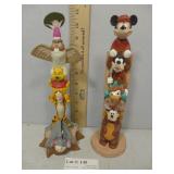 Two Walt Disney 11" H totems - Winne the Pooh &