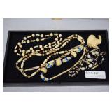 Colorful artist carved stone and bead necklaces &