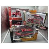 Four NIB Diecast Fire Truck/Rescue Vehicles incl