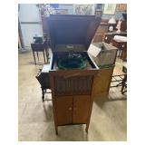 Brunswick record player in oak cased cabinet