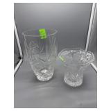 Two cut crystal vases fluted top and starburst