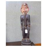 Carved Wooden Ancestral Figure with Shell Adornmen