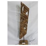 Carved African figure in headdress