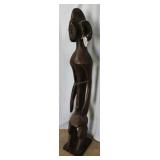 Carved African figure 7" w x 52" H
