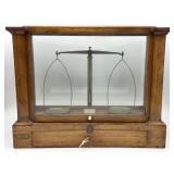 Becker & Sons scale in oak case