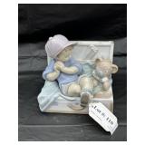 Lladro figure kid in toy box with bear
