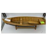 Wood model rowboat on stand