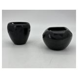 Two hand thrown black pottery bowls