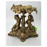 Cast metal cherub centerpiece