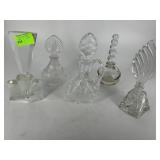 Five cut glass perfume bottles with stoppers