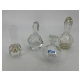 Four perfume decanters - Marquis Waterford, rose