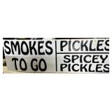 Smokes to Go / Pickles sign