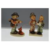 Two Goebel figures - boy with violin & two boys