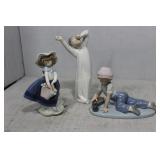 Three Lladro figures - girl with flower basket