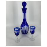 Cobalt cut to clear stoppered decanter & two
