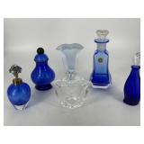 Five cobalt & clear perfume bottles