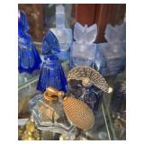 Five blue perfume bottles