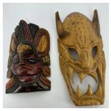 Two wood carved masks