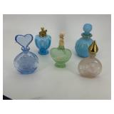 Five Spring colored perfume glass bottles with