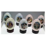 Seven Hummel Porcelain Eggs on stand by Danbury