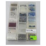 Assortment of Colored Beads incl blues, reds, and