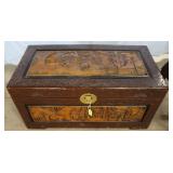 Carved Asian chest with brass locking hardware