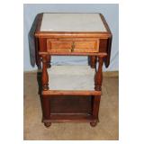 Oak drop leaf side table with single drawer and