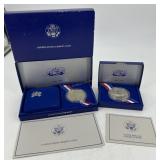 Two 1986 Liberty Silver Dollar Coins w/ spec sheet