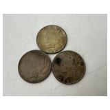 Three US Peace Dollars: 1922, (2) 1922-D