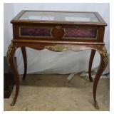 Entry Table with cabriole legs and cast metal moti