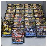 Twenty-Five NIP Hot Wheels Pro Racing Pit Crew Edi