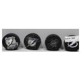 Four Tampa Bay Lightning Hockey Pucks autographed