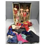 Barbie doll case with 4 dolls and accessories