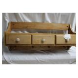 Oak three drawer wall shelf with hanging racks