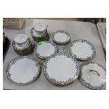 Limoge porcelain dinnerware - plates, saucers, &