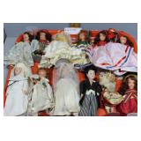 Twelve unboxed Storybook dolls on tray