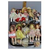 11 Storybook unboxed dolls incl baby outfit and