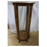 Cylindrical oak curio cabinet