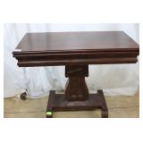 Mahogany Harp Occasional Table on metal casters -