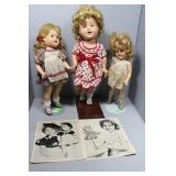 Three Shirley Temple resin dolls