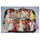 16 unboxed Storybook dolls on tray