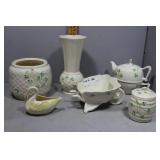 Seven pcs Belleek - Shamrock wheelbarrow, teacup,