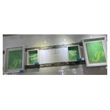 Four white shadowbox frames