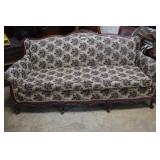 Formal Sofa with botanical carved framing and flor