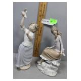 Lladro seated gal and NAO girl with bird