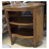 Oval table with two shelves