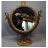 Brass swivel swan handled vanity mirror