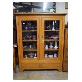 Oak glass front display cabinet with double drawer