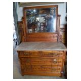 Three-drawer East Lake marbletop dresser with swin