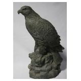 Cast concrete Eagle statue on rock